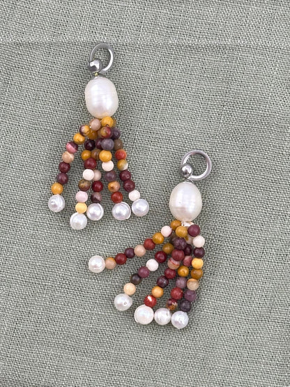 A Story of the First Rain Pendants